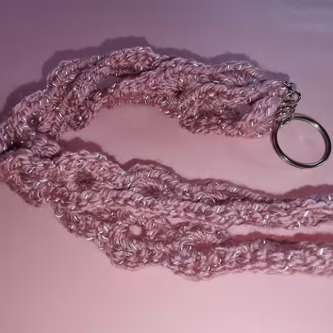 Nyckelband i reflexmaterial med rosa färg